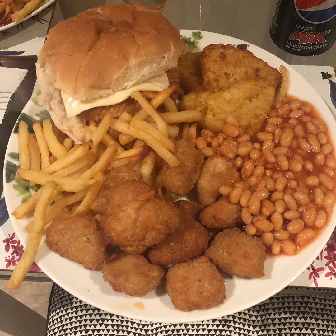 Day 36. Dinner #chickenburger with #cheese plus #hashbrowns #chips #bakedbeans a…