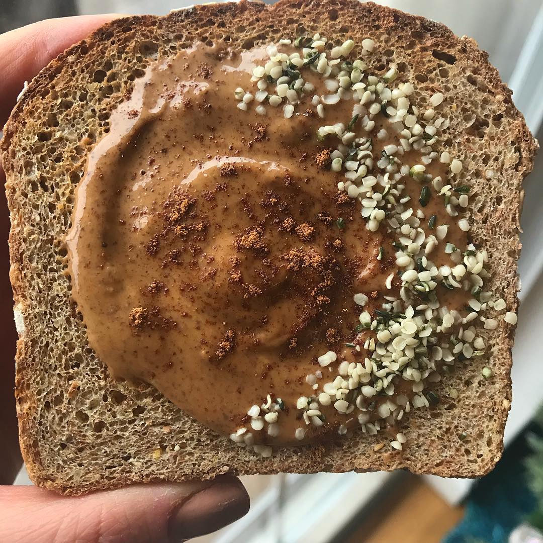 For this  we have some  ezekiel bread  topped with almond butter, cinnamon + fin…